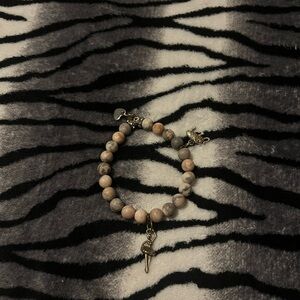 Elegant Beaded Bracelet with Charm